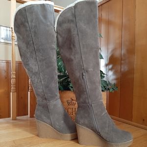 Tall wedge boots. New condition.
